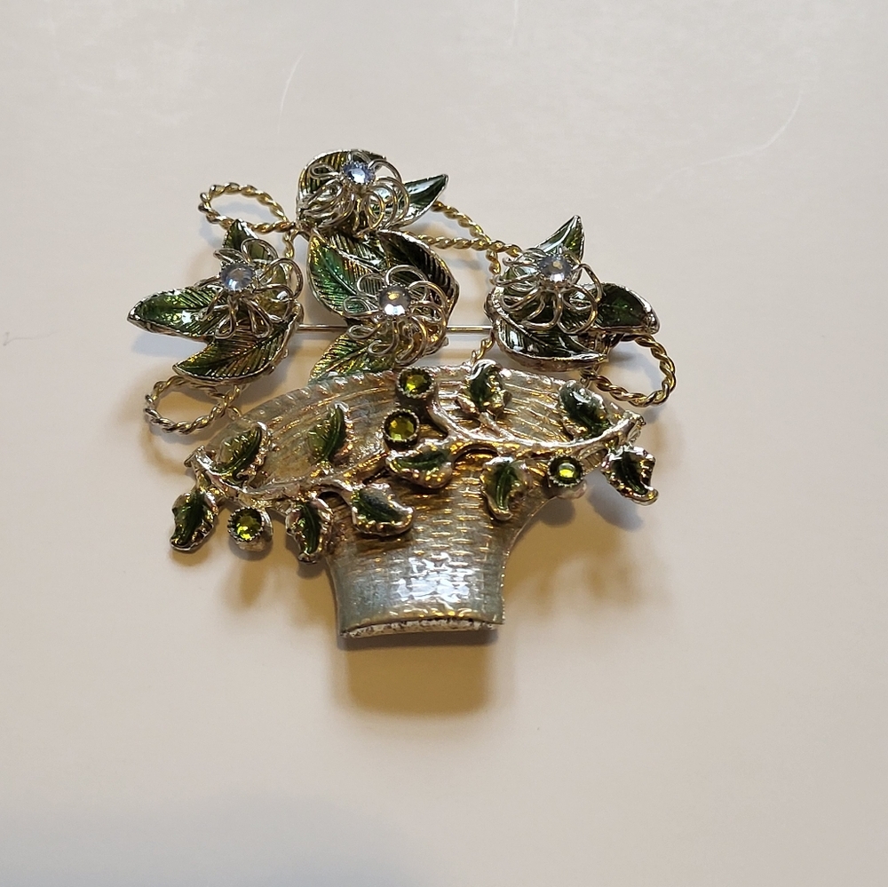 Vintage silver flower and basket brooch